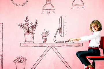 A child learns to code in front of a computer and prepares for a bright future